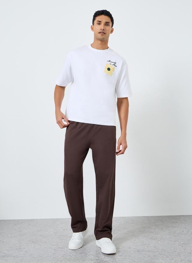 ستايلي تيشيرت واسع بطبعة جرافيك على الظهر - Image 1